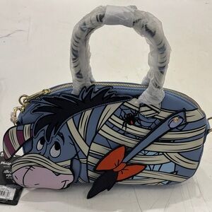 Loungefly Light Blue Eeyore Mummy Mini Bag with Orange Bow Accent